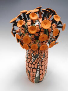 covered vessel with sculptural intent