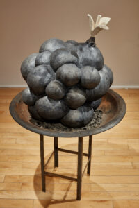 Stoneware, porcelain, fire pit, welded steel base, and ash