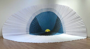 Found metal grate, folded & cut paper & paint. Site-specific installation for "Intervenida" solo show at Julio Fine Arts Gallery at Loyola University (Baltimore, MD).