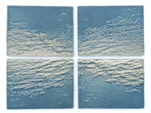The tiles were created by pressing clay onto molds. I create my molds by using a CNC to carve them, or 3D print prototypes that I cast plaster molds around. My designs are created in Rhino by using a heightfield image, translating a photograph into virtual surfaces that I digitally sculpt into tile forms.