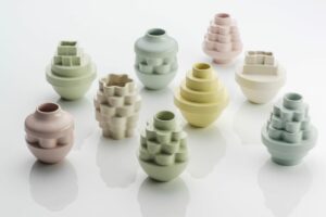 The simple experimenting of stack moulds , many pieces of small individual  mould on top each other to creat a form.
