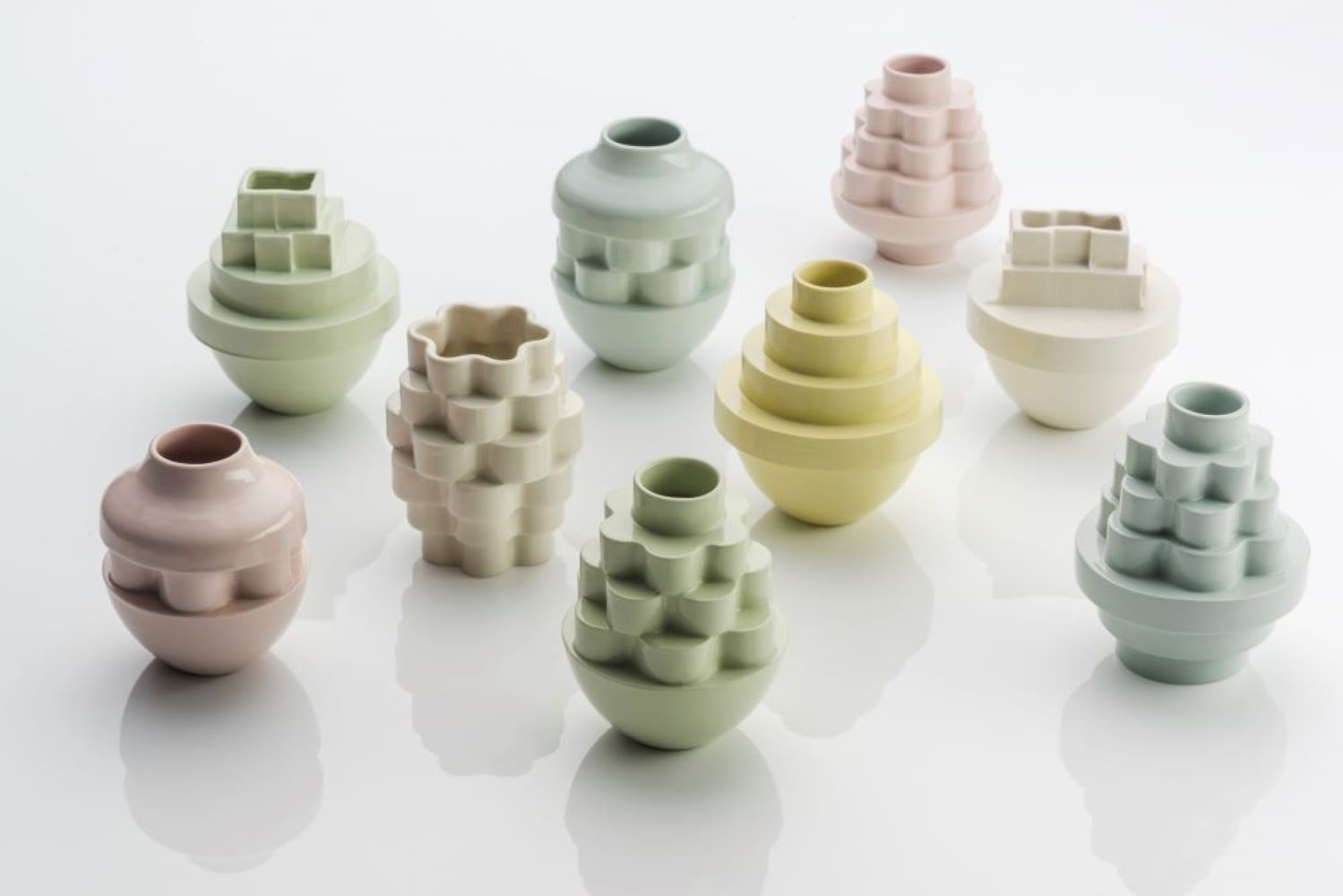 The simple experimenting of stack moulds , many pieces of small individual mould on top each other to creat a form.