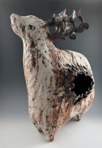 The rabbit has been an important marker in my work, and I have used it to explore a variety of themes, including loss. Loss and rebirth are evoked in this singular work, both through the linkages of the ears decorated with leaves, and the hole opened up in the form, which is simultaneously opening and closing. This form also asks the viewer to consider animal as both container and presence.