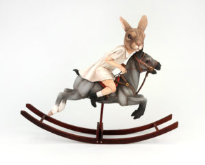 The rockers are handmade from ebony wood.