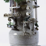 This vessel depicts different elements of an agrarian lifestyle.