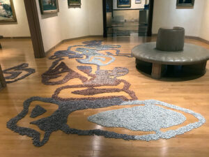 During this installation, the R.W. Norton Gallery was open. I invited visitors to sit with me and actively participate in the installation. I allowed them to sit where and how they chose. This installation grew organically and captured a larger conversation in this space and in the space connecting to it as well.