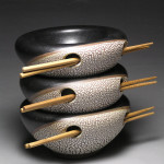 Double walled bowls, altered with black satin and reticulating glazes. Cone 10.