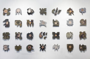 this work is a wall based installation of 21 elements fired in my train kiln for 50 hours on wood.
