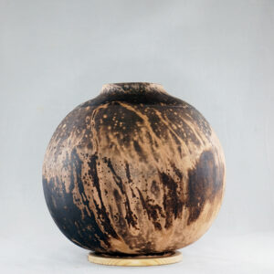 Obvara is a firing technique similar to the Raku technique, but the difference is that the vase gets dunked into a special Obvara mixture and then into water. This results in wonderful unpredictable patterns that look almost like animal prints or wood all around the vase. This technique originated from Eastern Europe and is also said to give an antique-like look to a ceramic piece.