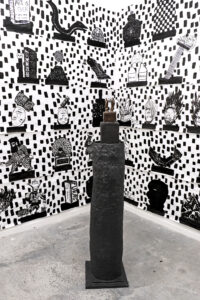 Current studio-based installation/  A 4’ sculpture is in front of dozens of drawings of sculptures that I plan to make out of clay.  Similar in size to previous submission.