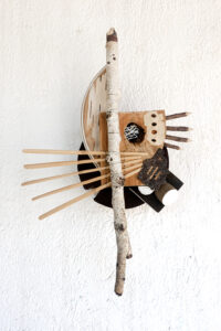 scrap wood & metal, reeds, wire, glue, clay-based paint & gesso