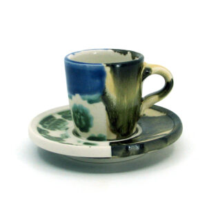 Demitasse cup and saucer for espresso. Decorated with assorted glazes and patterning