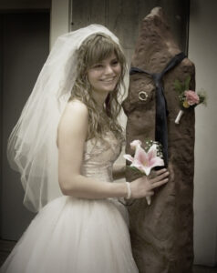 Carly Slade on her wedding day with Clay Medium