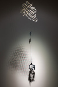 Hand-built porcelain, rubber, waxed linen, glaze, 18” x 36” x 8”, 2015