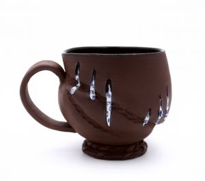 Interior and white drips are glazed