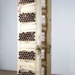 Porcelain, Found Doors, Beeswax, Acrylic Medium. 84”H x 30” W x 20”D. 2015