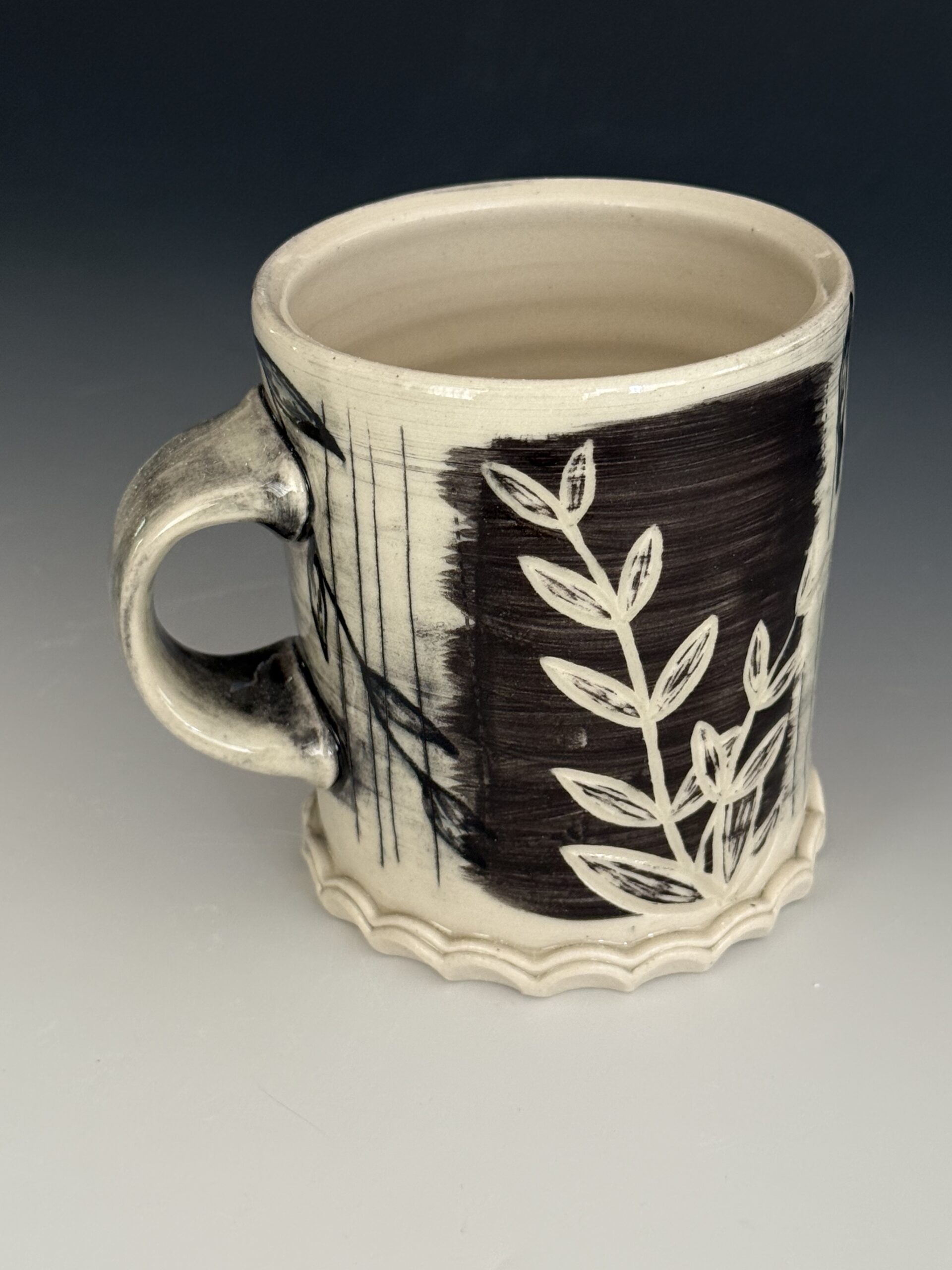 Porcelaneous stoneware, underglaze trailing and wash, Mishima, carving