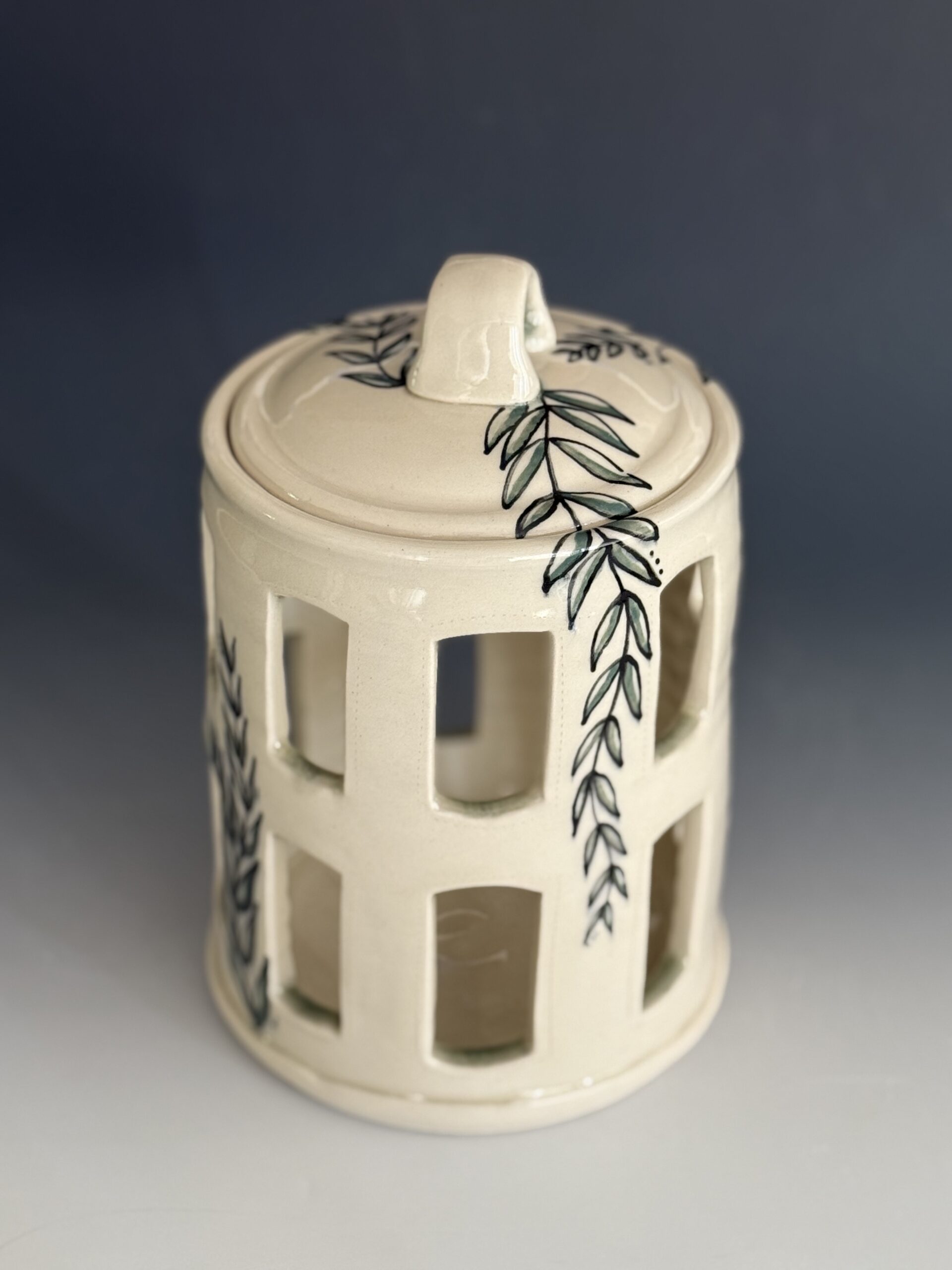 Porcelanous stoneware, underglaze trailing, colored slip and glaze