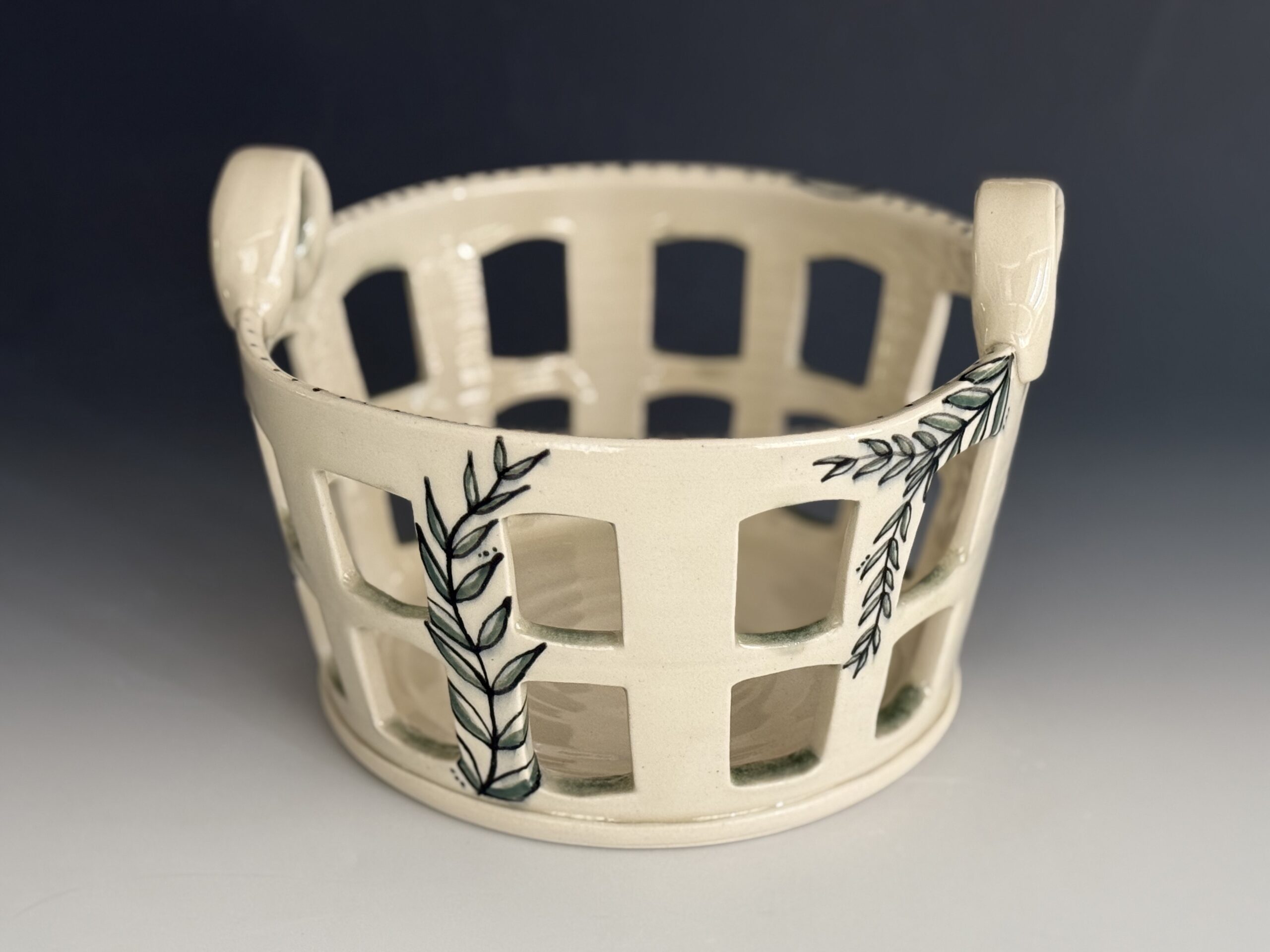 Porcelaneous stoneware, underglaze trailing, colored slip and glaze