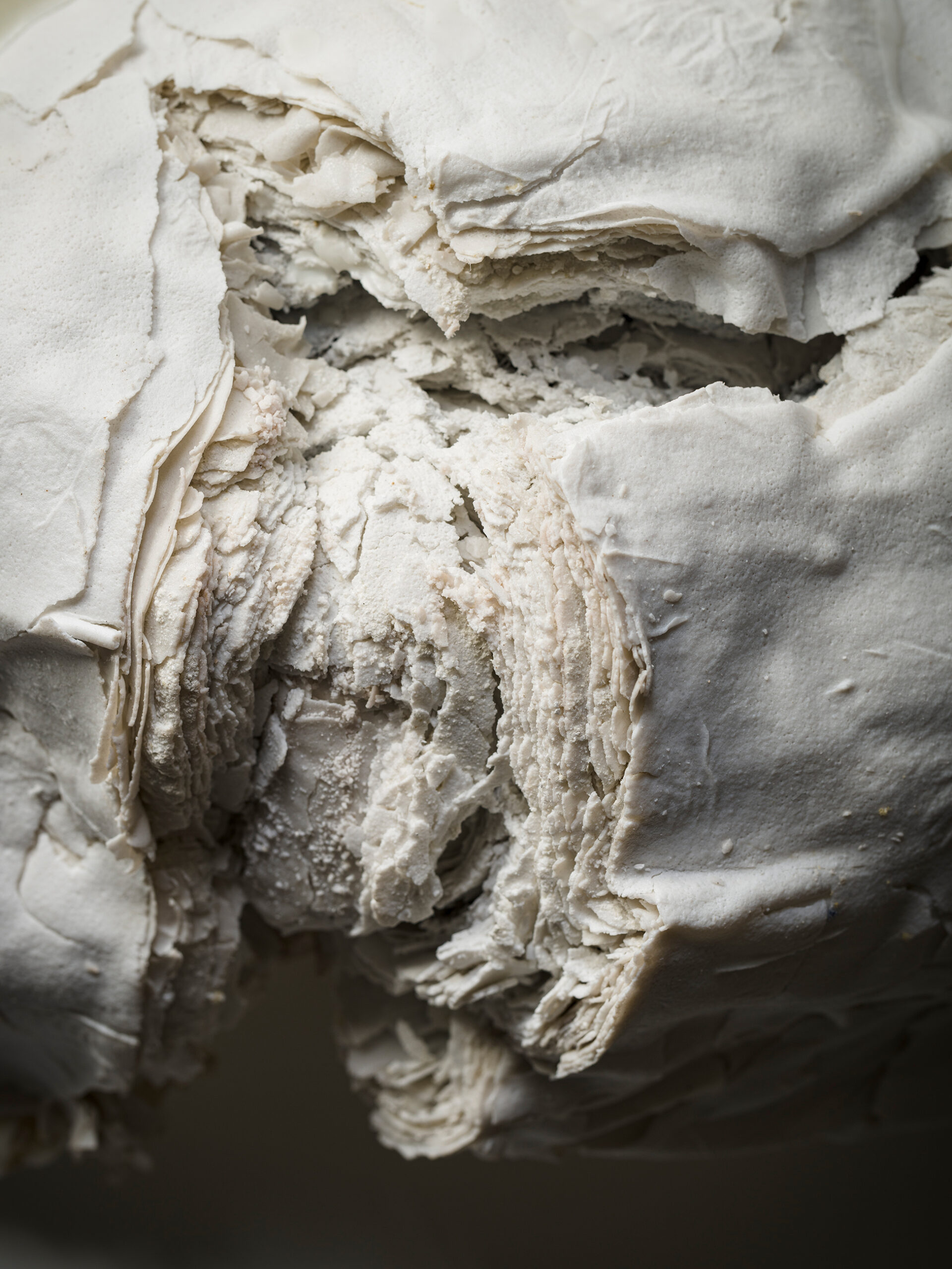 Material: Ceramic & Wax
Making Process:  Tape-casted roughly fifty layers clay then warped all together and tied tightly with a paper string.  After firing the piece is extremely fragile and unsustainable, however with wax  the work become sustained for preservation.