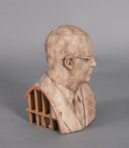 Full materials list: Earthenware, knick-knack shelf, wax, couch upholstery