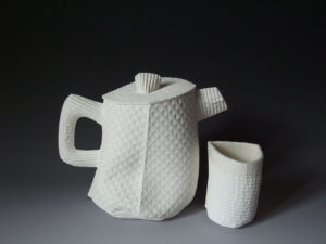 This series won an Honorable Mention award in Mino Japan in 2010. The work was made from flat cellulose sponges that have been sewn together to make soft, single use molds for porcelain slip.