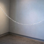 Oxidation fired porcelain, glaze, steel. Ceramic chain - individual links.10’