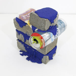 Bricks, trash, acrylic, sand